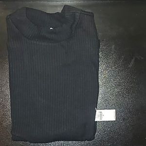 Mock neck sleeveless ribbed top